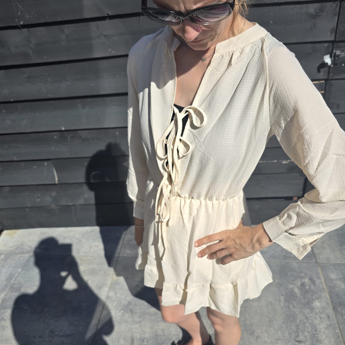 Zomerjurk met striksluiting en franjes