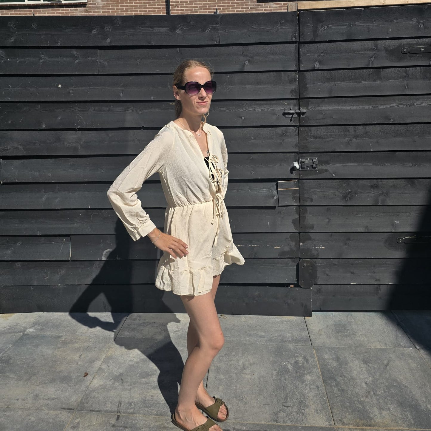 Zomerjurk met striksluiting en franjes