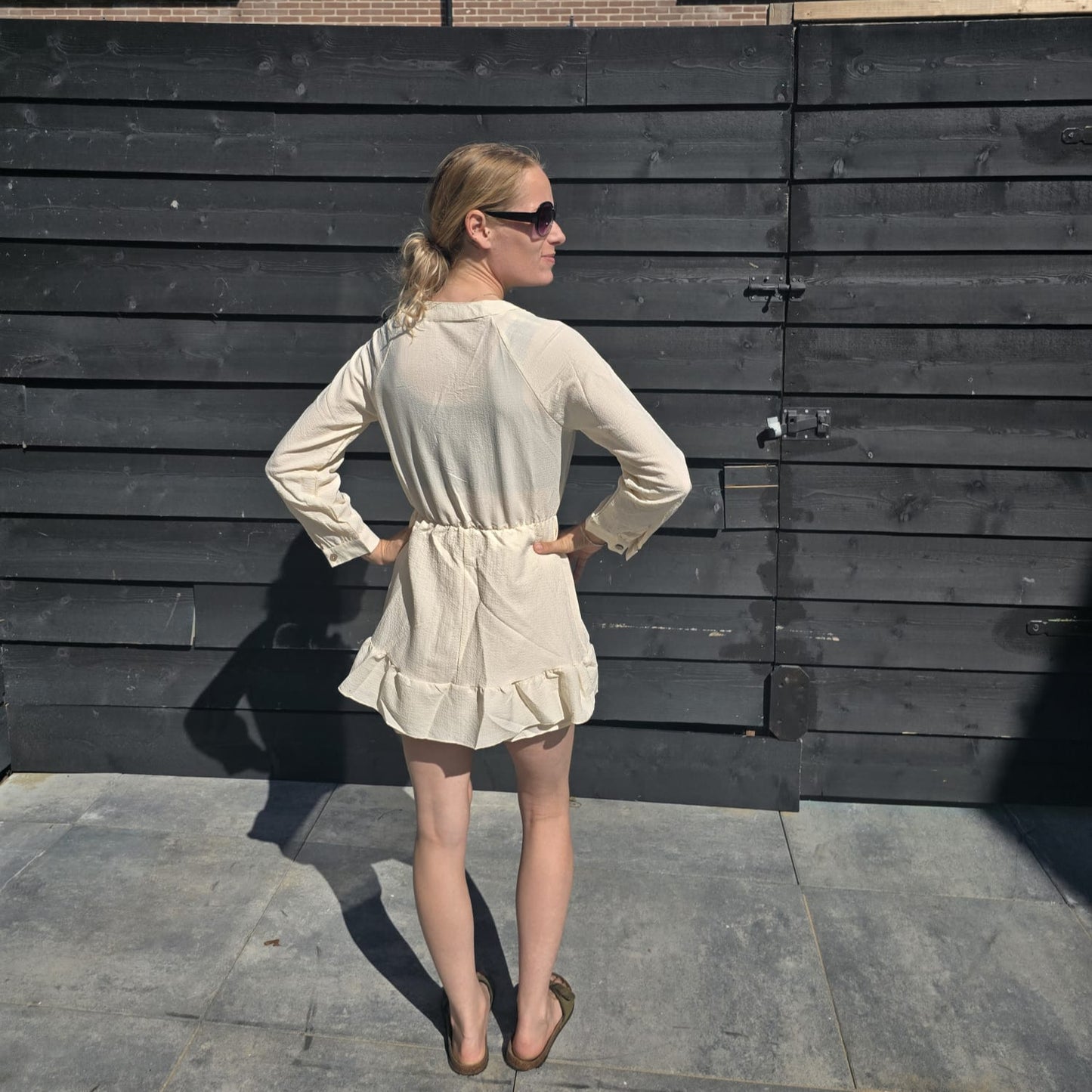 Zomerjurk met striksluiting en franjes